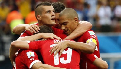 Switzerland's Xherdan Shaqiri celebrates his goal with his teammates during their 2014 World Cup Group E soccer match against Honduras at the Amazonia arena in Manaus