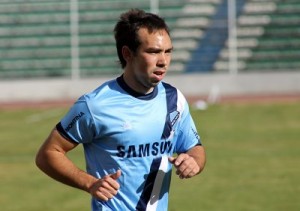 Damián Lizio con la camiseta de Bolívar